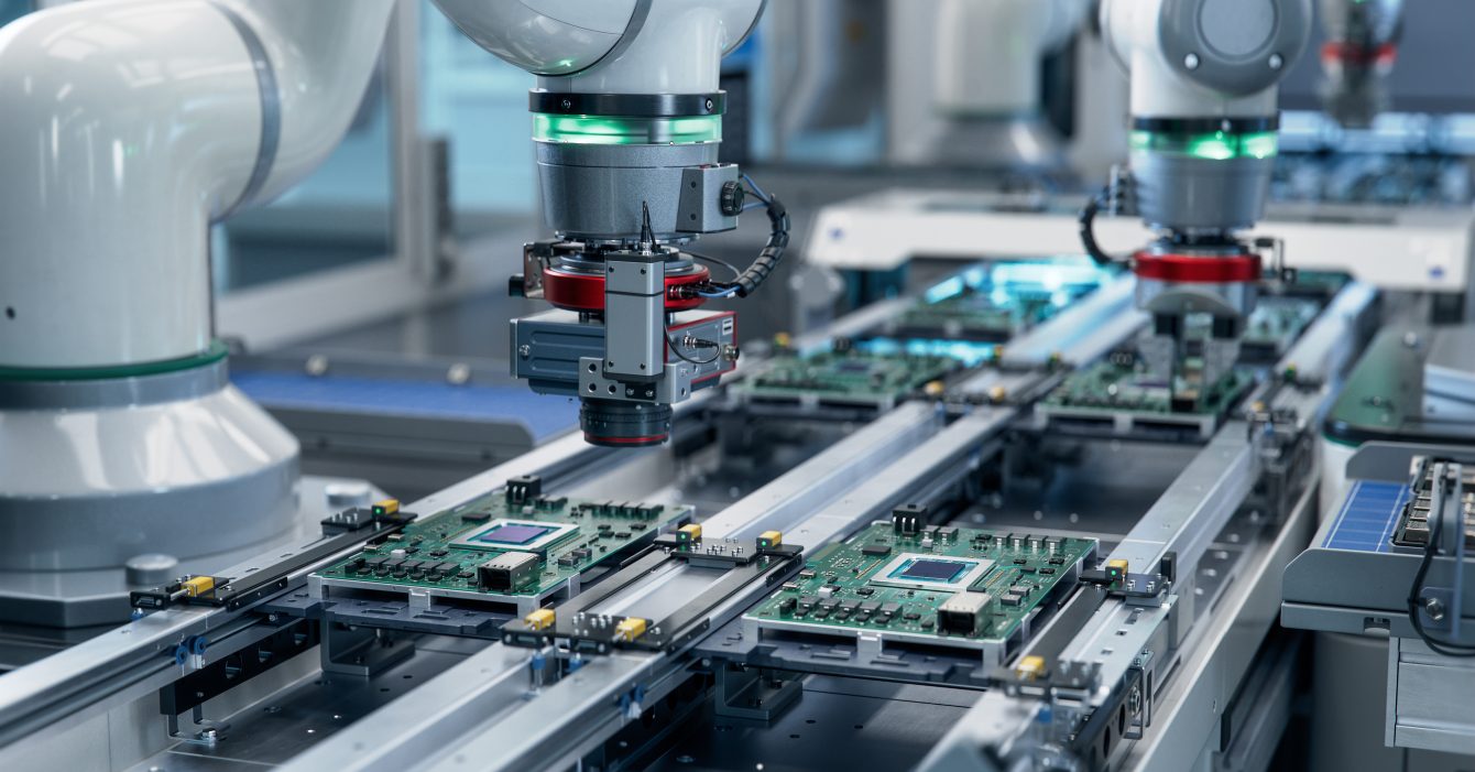 Component Installation and Quality Control of Circuit Board. Fully Automated PCB Assembly Line Equipped with High Precision Robot Arms at Electronics Factory. Electronic Devices Manufacturing Industry Component Installation and Quality Control of Circuit Board. Fully Automated PCB Assembly Line Equipped with High Precision Robot Arms at Electronics Factory. Electronic Devices Manufacturing Industry